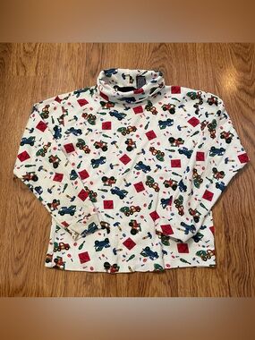 Vintage Medallion Cream Turtleneck Shirt with Colorful Toy Car and tools Print